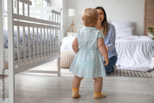 Adorable baby girl learning...