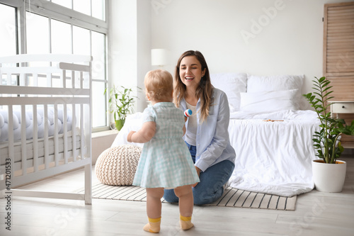 Adorable baby girl learning...