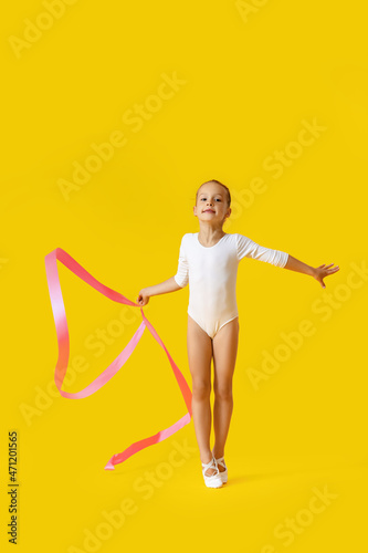 Little girl doing gymnastic...