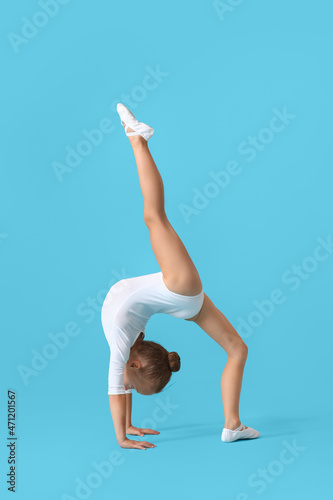 Little girl doing gymnastic...