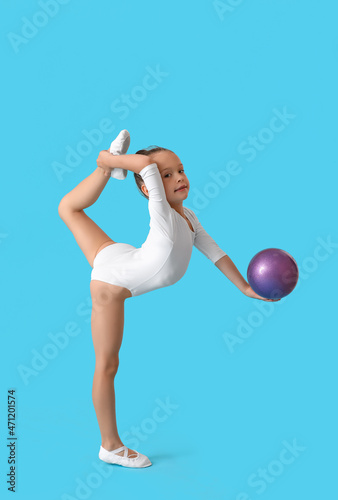 Little girl doing gymnastic...