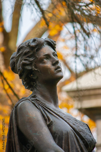 Bronze Statue Of A Woman Looking Up