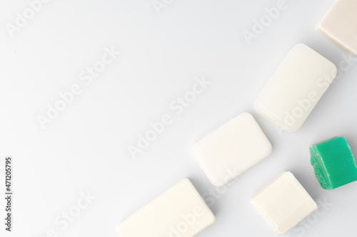 Top view of soap bars flat lay on white background