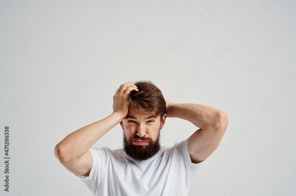 emotional man holding his head pain stress emotions Studio treatment emotional man holding his head pain stress emotions Studio treatment