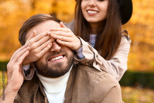 Woman closing eyes to her b...