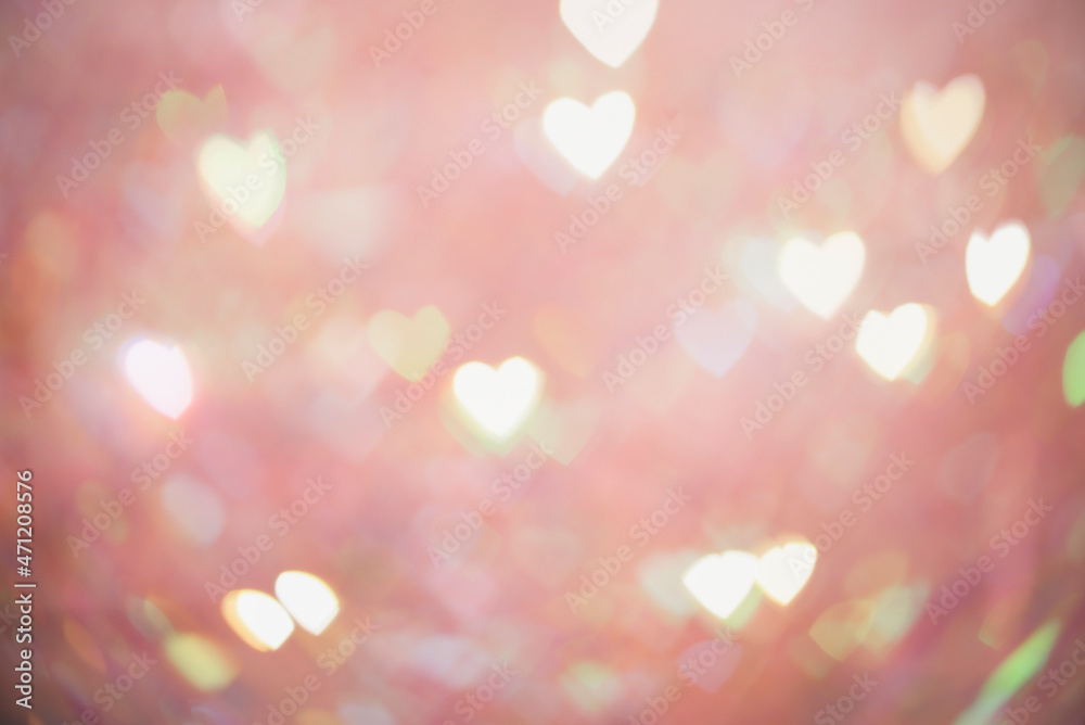 Natural pink bokeh of lights in the form of a heart, blurred out of focus background. Abstract beautiful backdrop for text or advertising. Postcard with love in light gentle colors Natural pink bokeh of lights in the form of a heart, blurred out of focus background. Abstract beautiful backdrop for text or advertising. Postcard with love in light gentle colors