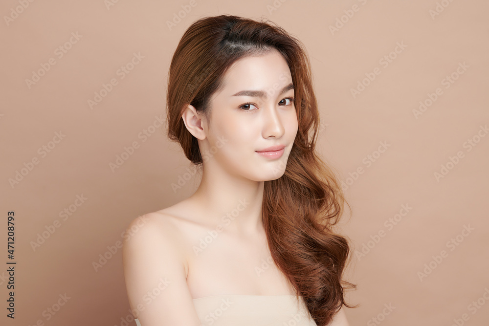 Beautiful young asian woman with clean fresh skin on beige background, Face care, Facial treatment, Cosmetology, beauty and spa, Asian women portrait. Beautiful young asian woman with clean fresh skin on beige background, Face care, Facial treatment, Cosmetology, beauty and spa, Asian women portrait.