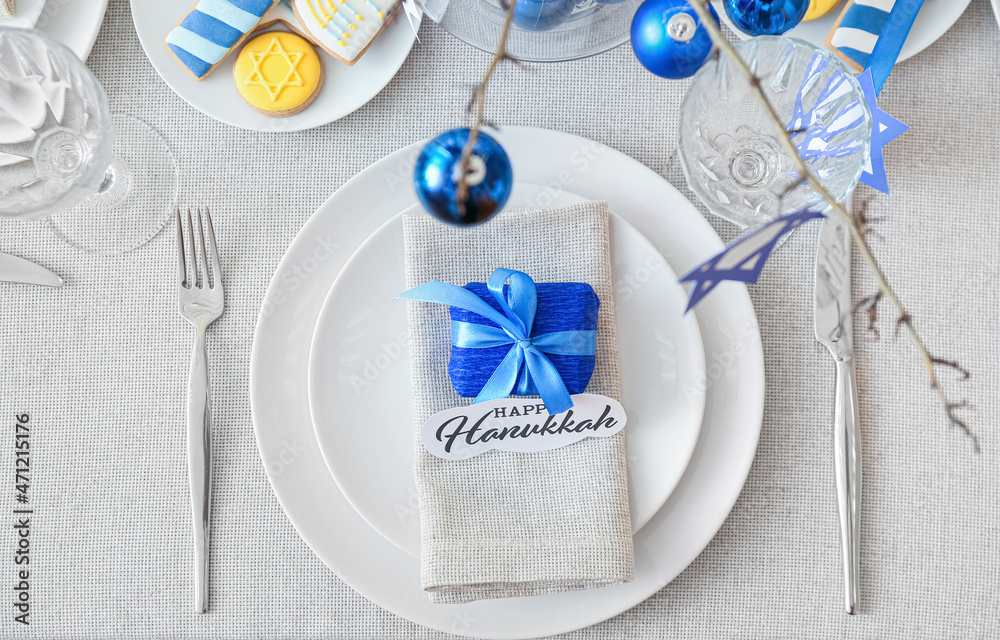 Beautiful table setting for Hanukkah celebration, top view Beautiful table setting for Hanukkah celebration, top view