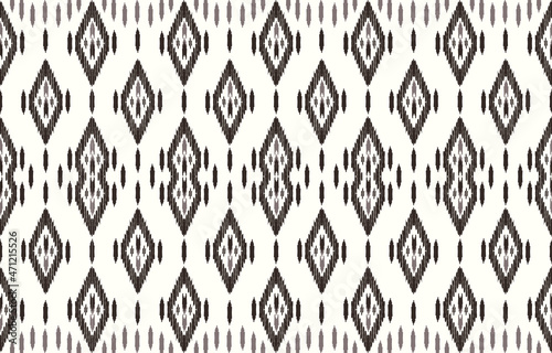 Monochrome dyed effect tribal diamond background designs and Ikat dyeing technique. Seamless vector design.