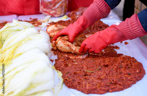 At the end of November 2021, they are making kimchi in Gyeongbuk, South Korea. (Kimchi is an old traditional food in Korea. There is a custom of making and sharing with the whole family.) photo