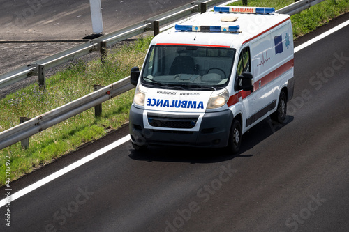 Ambulance. Special medical vehicles. Ambulance van on road. Ambulance service van on street. Ambulances drive on the new highway. 