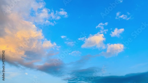 Yellow sky clouds on blue sky at sunset