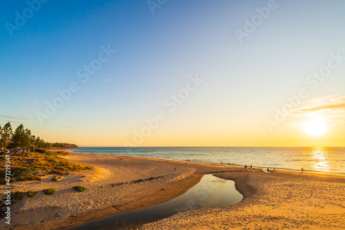 Christies Beach view with people at sunset viewed from the esplanade, South Australia