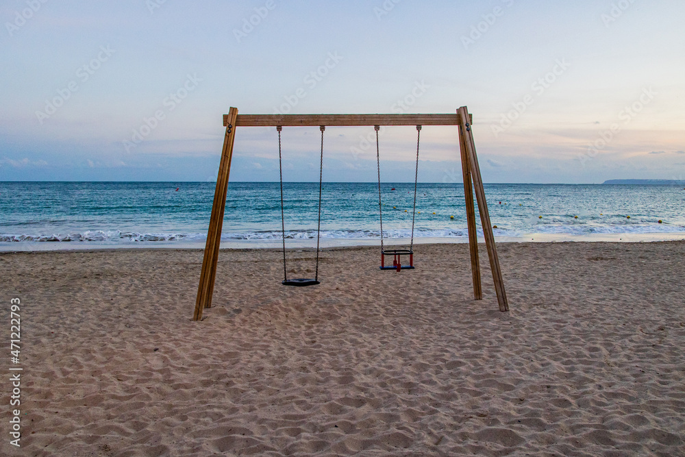 calm beach evening landscape with empty swing calm beach evening landscape with empty swing