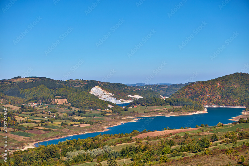 View of countryside lake Rovni, Serbia and hilly landscape in autumn colors. View of countryside lake Rovni, Serbia and hilly landscape in autumn colors.