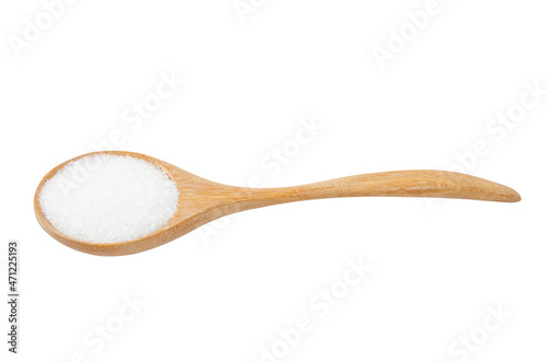 Monosodium glutamate in wooden spoon.