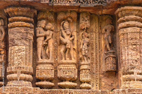 Temple platform of Jagamohana carved with erotic couples, young women flaunting their beauty in poses, nagas, vyalas, soldiers, elephants, court scenes Sun Temple Konark, Odisha, India.