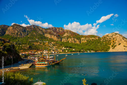 TURUNCH, TURKEY: Top view of the pirate ships and boats on the coast of Turunch on a sunny summer day.