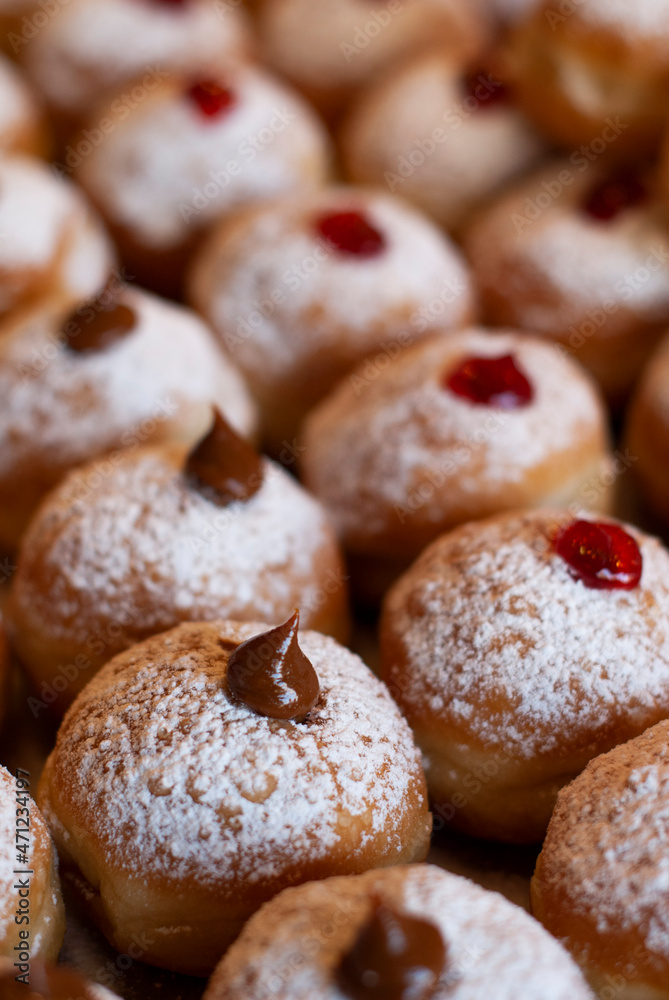 Sugar-coated caramel and jelly donuts for sale in Israel during the Jewish holiday of Hanukkah. 
