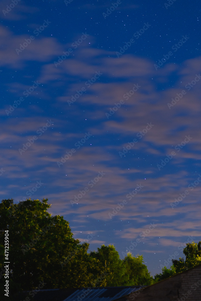 Sunset clouds over the forest