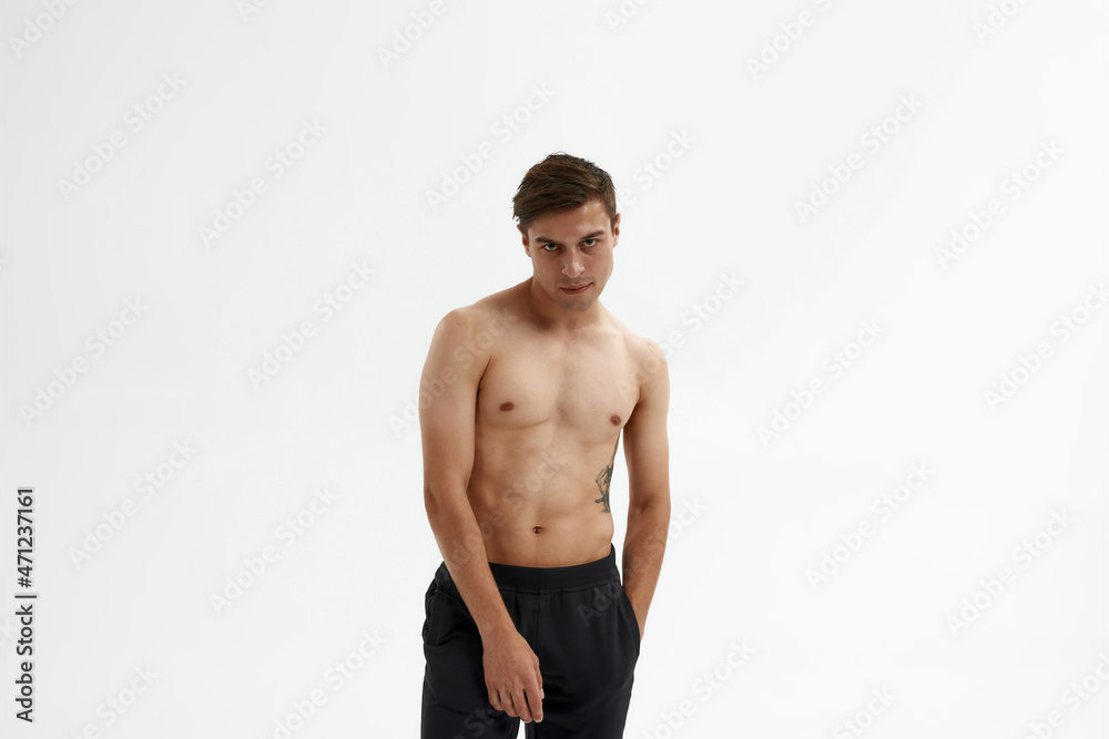 Young caucasian ballet dancer with hand in pocket Young caucasian ballet dancer with hand in pocket