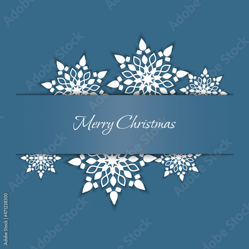 Christmas card with cut out snow-white openwork snowflakes cut from paper. New Year's applique