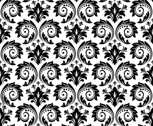 Wallpaper in the style of Baroque. Seamless vector background. White and black floral ornament. Graphic pattern for fabric, wallpaper, packaging. Ornate Damask flower ornament