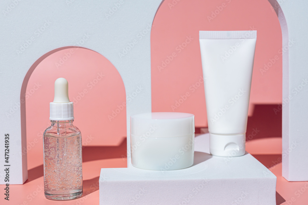 Beauty cosmetic skincare on pink background. Trendy presentation with podiums and hard shadows. Mockup for your design Beauty cosmetic skincare on pink background. Trendy presentation with podiums and hard shadows. Mockup for your design