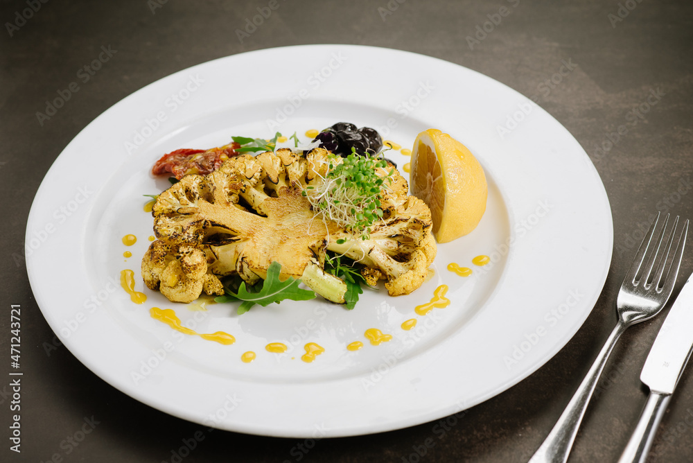 Dish with boiled cauliflower and herbs. Detox menu Dish with boiled cauliflower and herbs. Detox menu