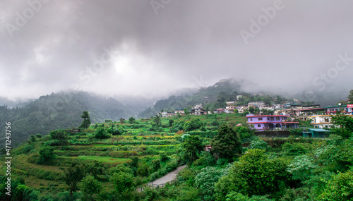 Photography Scenic view of mountains against cloudy sky