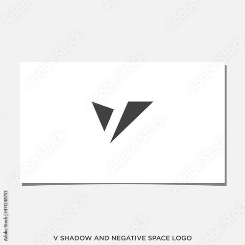 V SHADOW AND NEGATIVE SPACE LOGO DESIGN