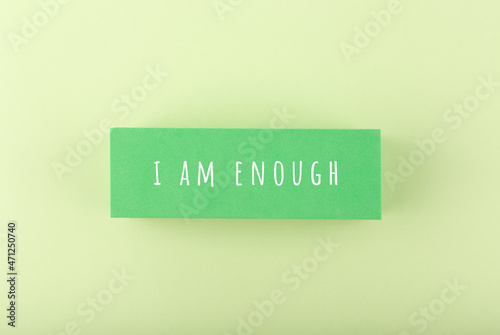 Obraz na płótnie I am enough concept on bright light green background. Lettering design for positive, motivation quote, mental health and body positive w salonie
