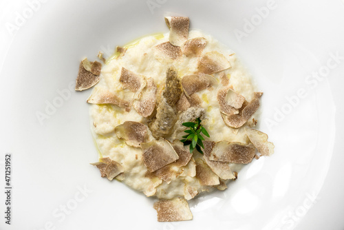 Plate with cod cream and white truffle photo