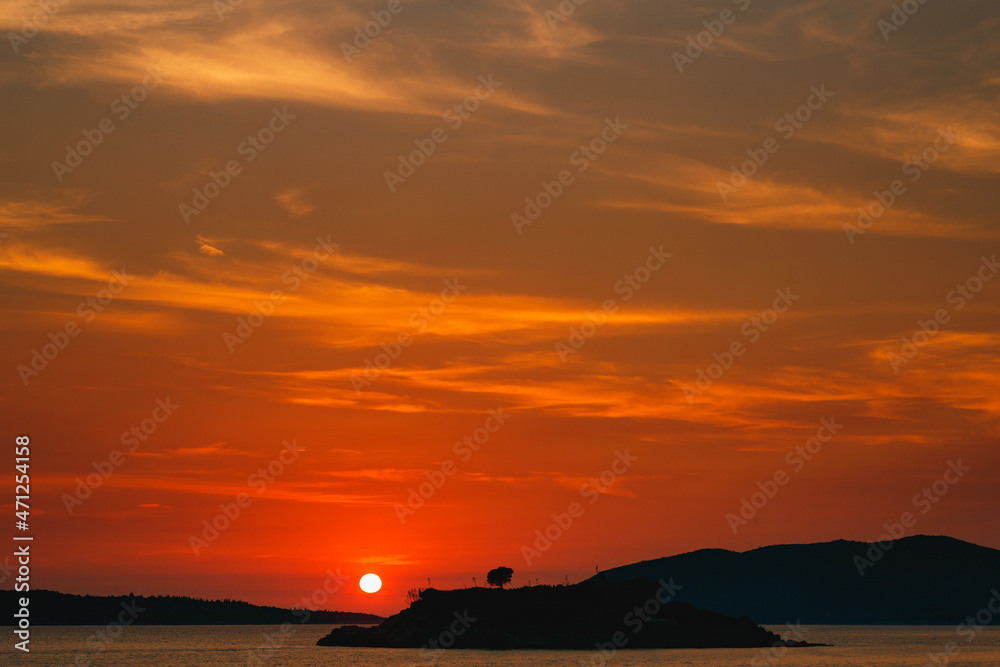 Red sunset on Mamula island. Montenegro