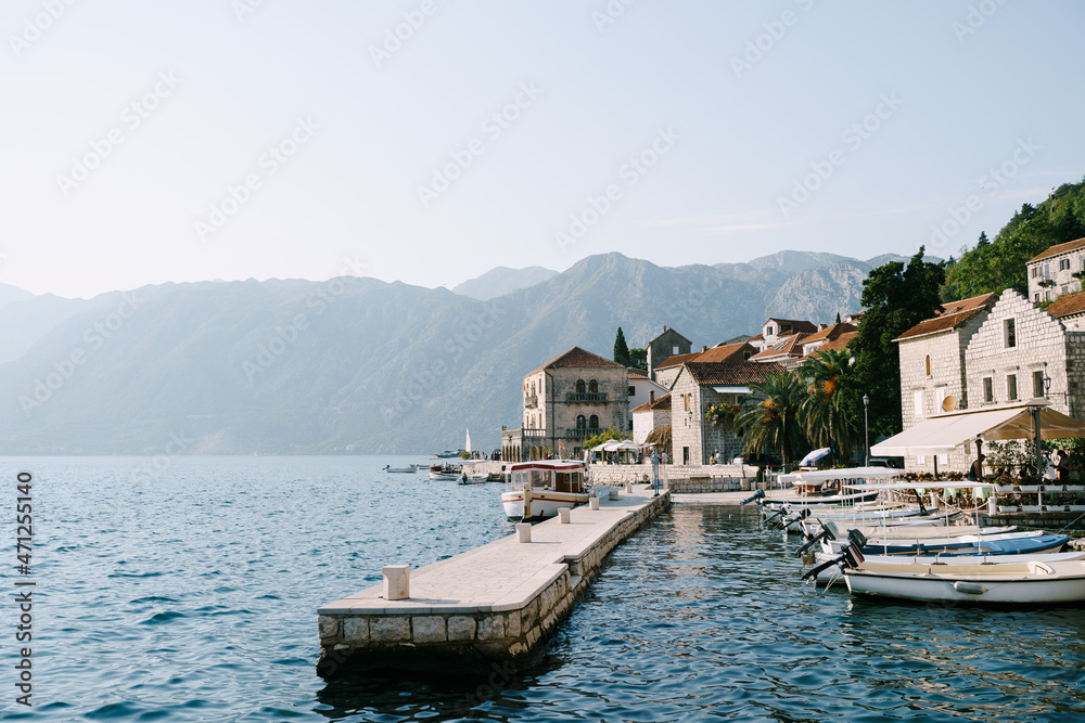Moored boats at the pier. Perast. Montenegro