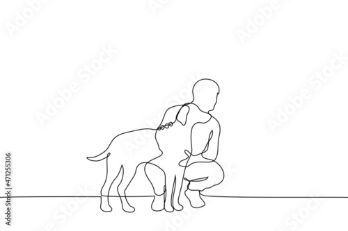 man squatted hugging dog they both look in the same direction - one line drawing vector. concept of petting dog, walking pet