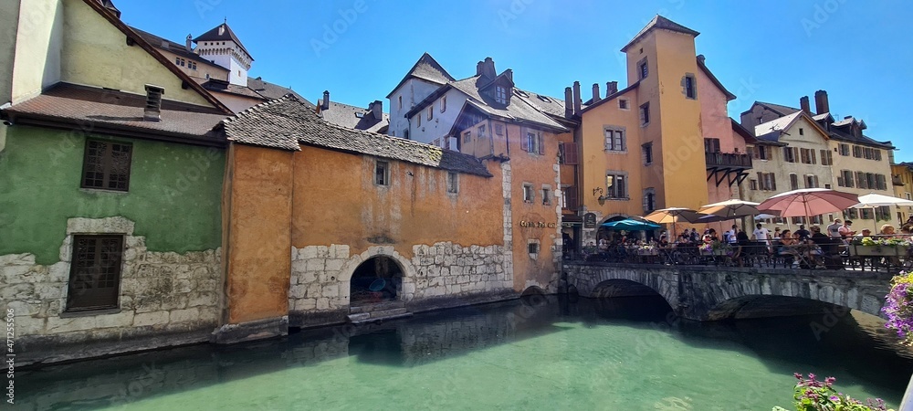 Canals with flowers and cafes in Annecy, France