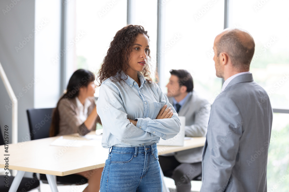 furious businesswoman arguing strongly, having disagreement and conflict for works in meeting room