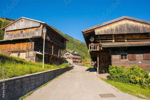 A road of traditional wooden buildings in the Alpine village of Sauris di Sopra, Udine Province, Friuli-Venezia Giulia, north east Italy 