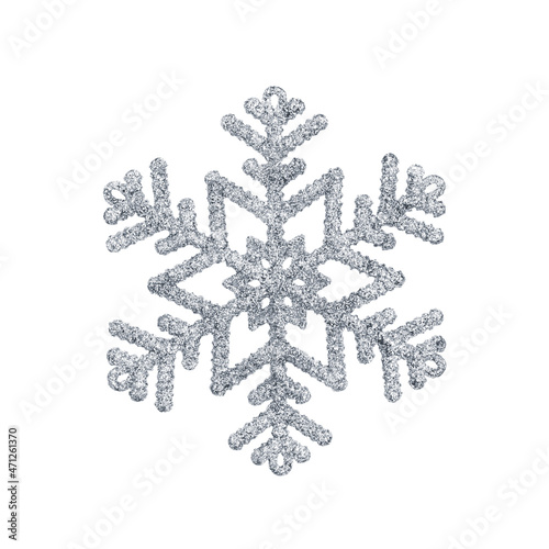 Silver toy snowflake isolated on a white background.