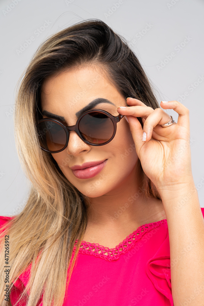 sunglasses, woman, fashion, glasses, beauty, face, model, hair, people, lady, person, glamour, summer, lips, teen, one, smile, brunette, studio, style, eyes, stylish, black, elegance, looking