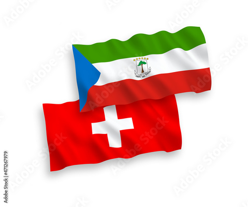 National vector fabric wave flags of Republic of Equatorial Guinea and Switzerland isolated on white background. 1 to 2 proportion.