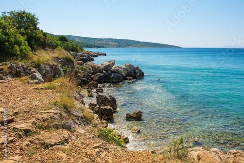A coastal path south of the town of Punat on Krk Island in Primorje-Gorski Kotar County in western Croatia during late summer
