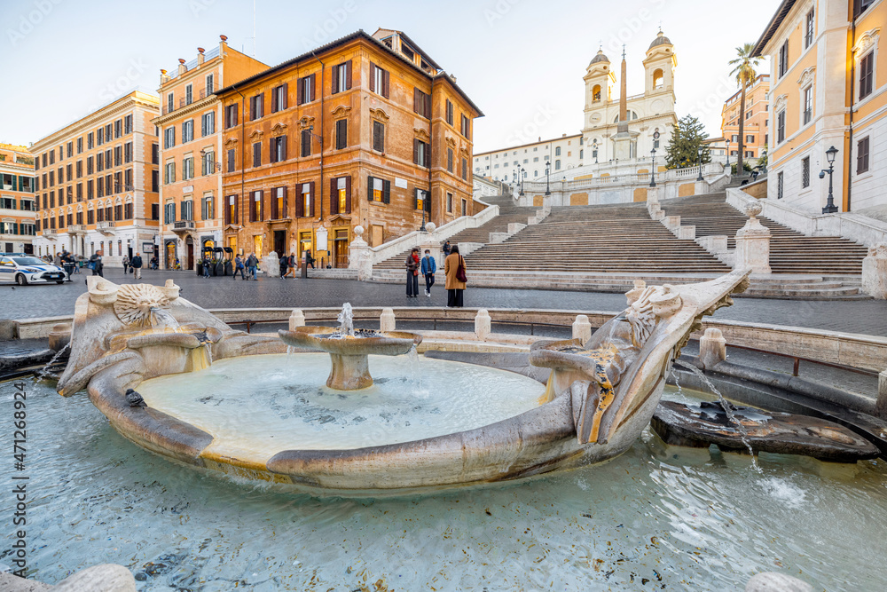 Cityscape of famous Spanish Steps and Fountain of the Old Boat at sunny morning in Rome. Visiting Famous italian sightseeings, traveling Italy