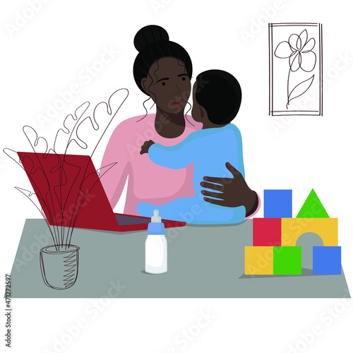 A dark-skinned woman with a child and a laptop sits at a table, working on maternity leave, a mother with a child works at home remotely