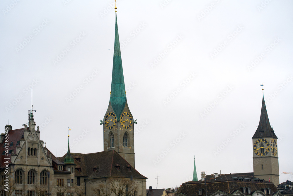 Women's Minster church and Great Minster Church at the old town of Zürich on a gray autumn day. Photo taken November 22nd, 2021, Zurich, Switzerland.