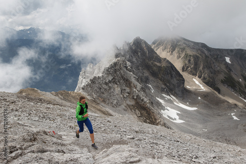 Women trail running in the European alps of Austria