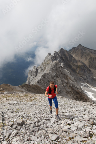 Women trail running in the European alps of Austria
