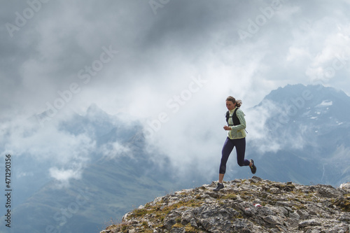 Women trail running in the European alps of Austria