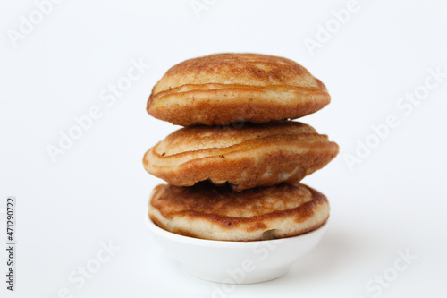 Kue Samir or Kamir or Khamir, traditional pancake from Pemalang, Indonesia. Isolated on whte background. Side view.